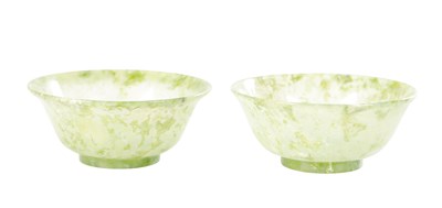 Lot A PAIR OF 19TH CENTURY CHINESE JADE BOWLS
