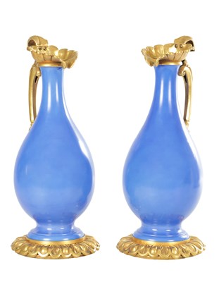 Lot A LARGE PAIR OF 19TH CENTURY ORMOLU MOUNTED BLUE PORCELAIN BOTTLE VASES
