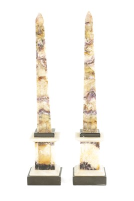 Lot A PAIR OF 19TH CENTURY BLUE JOHN OBELISKS