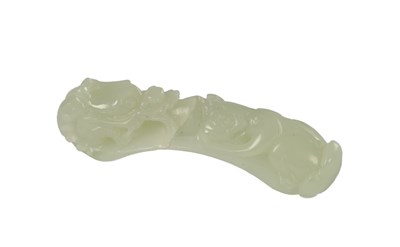 Lot A CHINESE QING DYNASTY CARVED JADE BELT HOOK