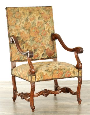 Lot A 19TH CENTURY FRENCH CARVED WALNUT AND UPHOLSTERED ARMCHAIR