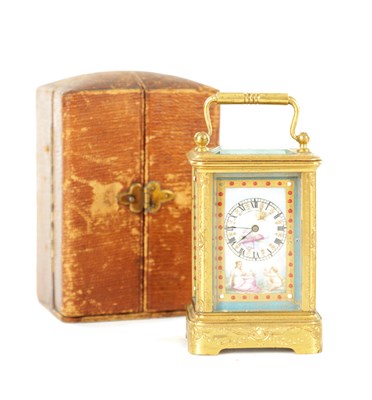 Lot MARGAINE, PARIS. A LATE 19TH CENTURY MINIATURE GILT ENGRAVED PORCELAIN PANELLED CARRIAGE CLOCK