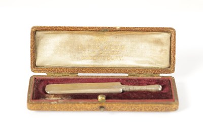 Lot AN EDWARDIAN CASED MINIATURE SILVER CRICKET BAT