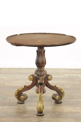 Lot A REGENCY FIGURED MAHOGANY AND PARCEL GILT OCCASIONAL TABLE