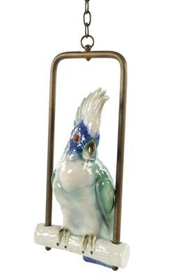 Lot AN EARLY 20TH CENTURY CONTINENTAL PORCELAIN PARROT