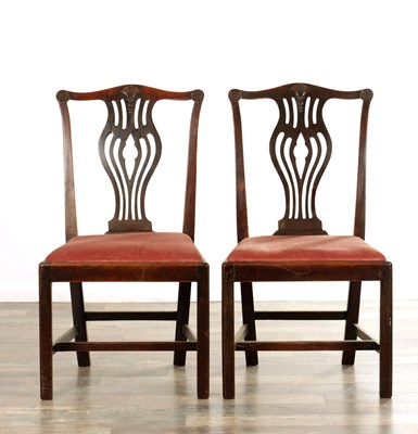 Lot A PAIR OF GEORGE III CHIPPENDALE STYLE MAHOGANY SIDE CHAIRS POSSIBLY IRISH