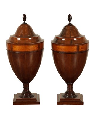 Lot A PAIR OF LATE 19TH CENTURY SHERATON STYLE INLAID MAHOGANY KNIFE URNS