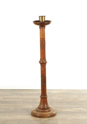 Lot A LATE 19TH CENTURY OAK ASTHETIC PERIOD CANDLESTICK