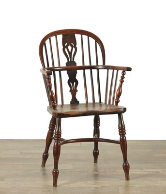 Lot AN EARLY 19TH CENTURY YEW-WOOD LOW BACK WINDSOR CHAIR