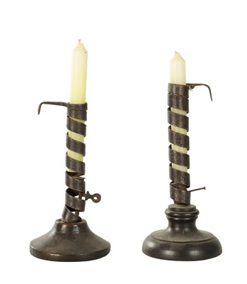 Lot TWO 18TH CENTURY SPIRAL STEM IRONWORK PIGTAIL CANDLESTICKS