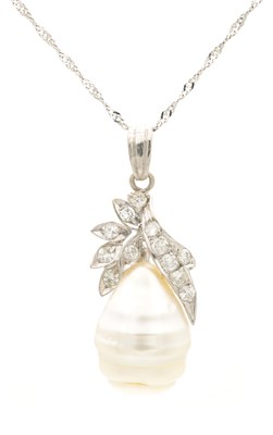 Lot A MID 20TH CENTURY WHITE GOLD, DIAMOND AND BAROQUE PEARL PENDANT NECKLACE