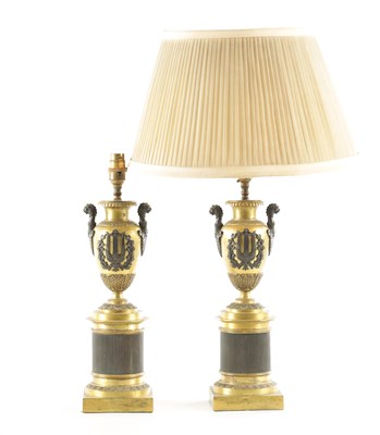 Lot A PAIR OF 20TH CENTURY REGENCY STYLE BRONZE AND GILT BRONZE TABLE LAMPS