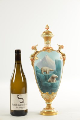 Lot A FINE AND RARE ROYAL WORCESTER PORCELAIN LIDDED CABINET VASE OF LARGE SIZE PAINTED WITH POLAR BEARS BY HARRY DAVIS
