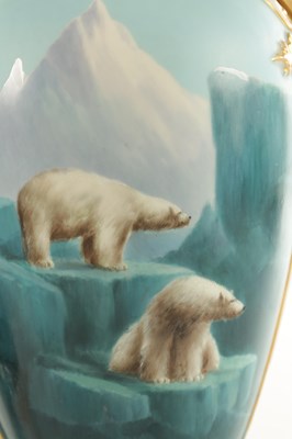 Lot A FINE AND RARE ROYAL WORCESTER PORCELAIN LIDDED CABINET VASE OF LARGE SIZE PAINTED WITH POLAR BEARS BY HARRY DAVIS