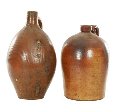 Lot A 17TH CENTURY STONEWARE BELLARMINE AND A 19TH CENTURY STONEWARE ALE JUG