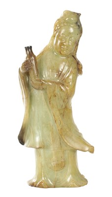 Lot A LARGE CHINESE CARVED RUSSET JADE FIGURE