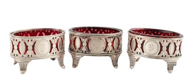 Lot A SET OF THREE LATE 19TH CENTURY SILVER TABLE SALTS