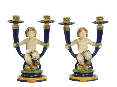 Lot A PAIR OF 19TH CENTURY MINTON MAJOLICA TWO BRANCH CANDELABRA