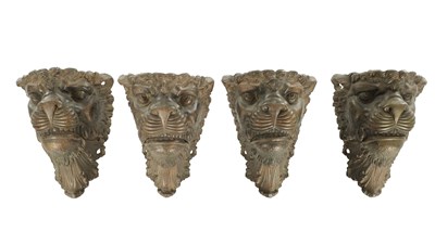 Lot A SET OF FOUR 19TH CENTURY BRONZE LION HEAD MOUNTS / BILLIARD TABLE POCKETS