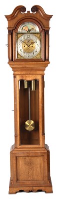 Lot 633 - AN EDWARDIAN OAK LONGCASE CLOCK the honey...