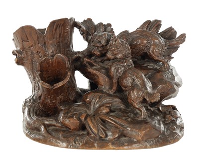 Lot A 19TH CENTURY CARVED BLACK FOREST SCULPTURE