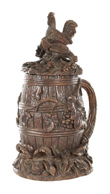 Lot A 19TH CENTURY CARVED BLACK FOREST TABACCO JAR