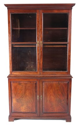 Lot 658 - A GEORGE II FLAMED MAHOGANY GLAZED BOOKCASE OF...