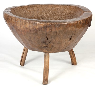 Lot 670 - AN EARLY PRIMITIVE DUG OUT ELM CHOPPING TABLE...