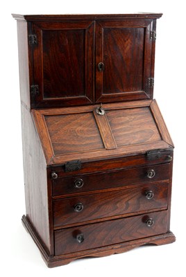 Lot 697 - A GEORGE III MINIATURE ELM TABLE BUREAU...