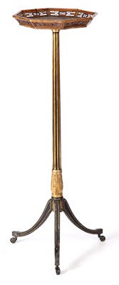 Lot 704 - A REGENCY EBONISED AND GILT PAINTED TORCHERE...