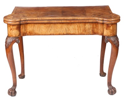 Lot 709 - A GOOD GEORGE I FIGURED WALNUT CARD TABLE OF...