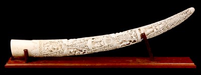Lot 97 - A 19TH CENTURY INDIAN CARVED IVORY TUSK with...