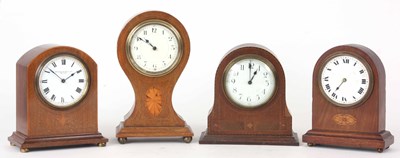 Lot 117 - FOUR EARLY 20th CENTURY FRENCH MAHOGANY MANTLE...