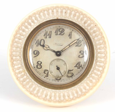 Lot 138 - AN EDWARDIAN IVORY FRAMED STRUT CLOCK 7cm...