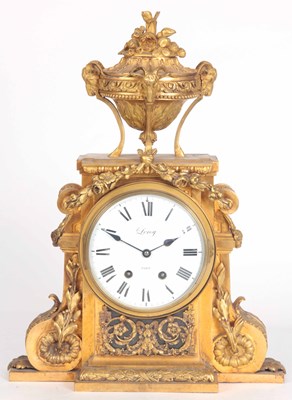 Lot 169 - A FRENCH ORMOLU MANTLE CLOCK surmounted by a...