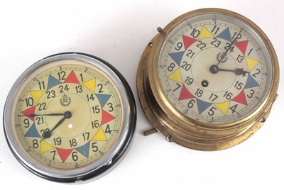 Lot 193 - TWO R.A.F. TYPE CLOCKS one in a brass case...