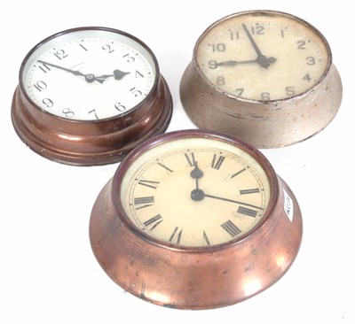 Lot 241 - THREE COPPER CASED ELECTRIC SLAVE CLOCKS 29cm,...