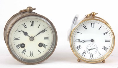 Lot 244 - TWO BRASS CASED DRUM SHAPED CLOCKS, one with...