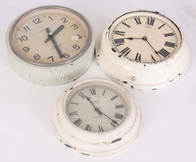 Lot 246 - THREE ELECTRIC WALL CLOCKS WHITE PAINTED TIN...