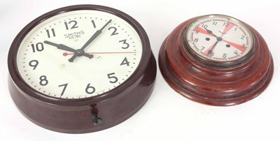 Lot 248 - TWO WALL CLOCKS one smiths electric in a...