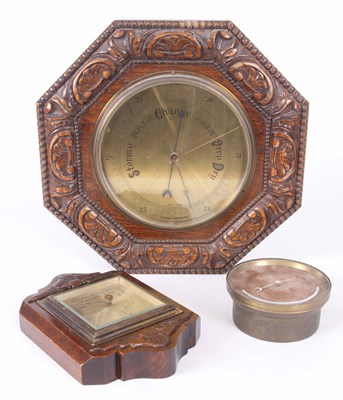 Lot 283 - A COLLECTION OF THREE ANEROID BAROMETERS, the...