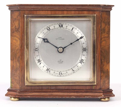 Lot 287 - A WALNUT CASED MANTLE CLOCK by Elliott with...