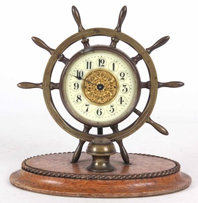 Lot 325 - AN EARLY 20th CENTURY NAUTICAL DESK CLOCK...