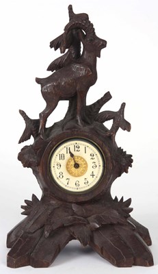 Lot 351 - AN EARLY 20th CENTURY BLACK FOREST CARVED...