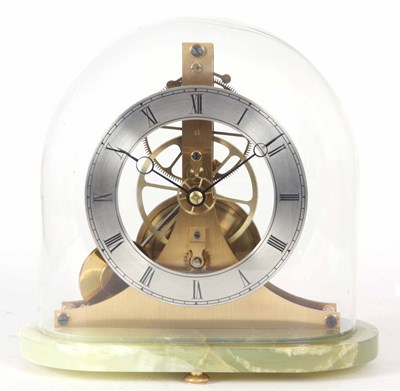 Lot 428 - AN UNUSUAL THREE WHEEL SKELETON CLOCK ON ONYX...