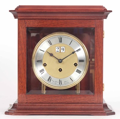 Lot 438 - A MODERN QUARTER CHIMING MANTLE CLOCK the...