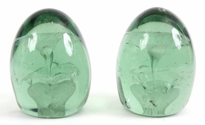 Lot 463 - A PAIR OF 19th CENTURY GREEN GLASS DUMPS with...