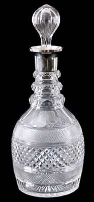 Lot 4 - A SILVER MOUNTED GLASS CUT DECANTER with...
