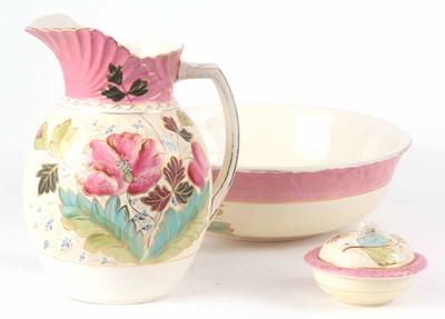 Lot 496 - A JUG AND BOWL SET WITH SOAP DISH having pink...