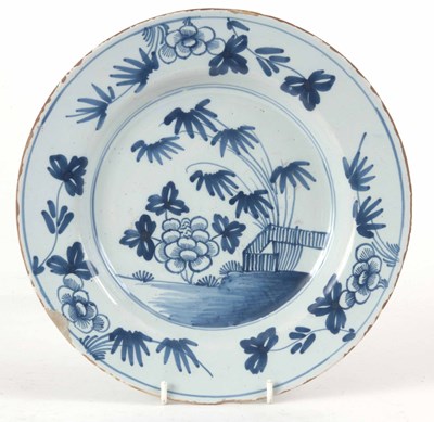 Lot 511 - A DELFT 18th CENTURY PLATE 27cm diameter